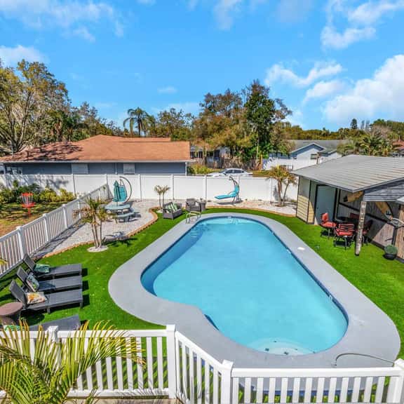 Huge 8BR Stay | Heated Pool, Game Room, Near Beach - Image 1